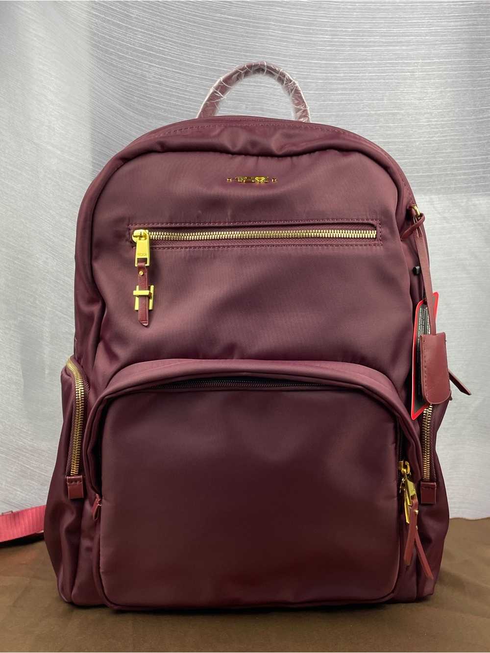 Tumi Burgundy Backpack with Gold Hardware- New